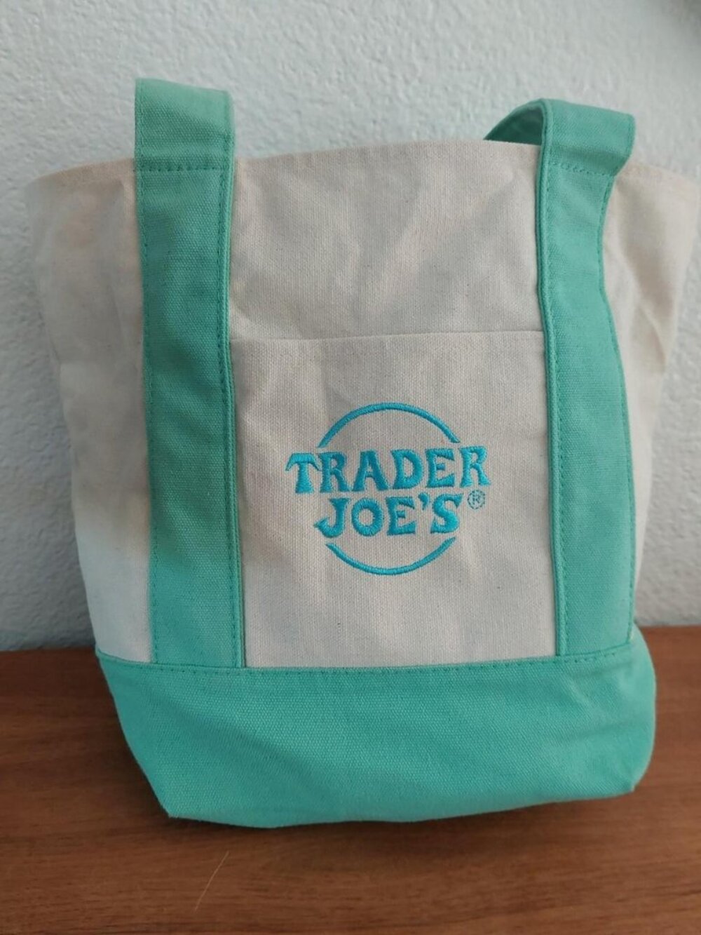 pastel mint green mini canvas tote bag from Trader Joe's featuring matching mint